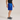 side view of man wearing Soffe Polyester Mini Mesh Shorts royal blue color